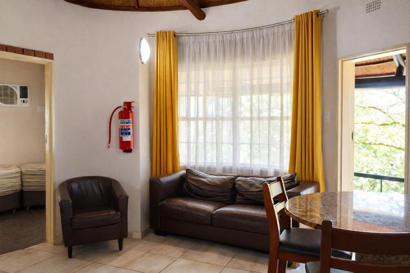 Badplaas, A Forever Resort: 4-Sleeper Rondavel. 2 bedrooms (1 double & 2 single rooms)