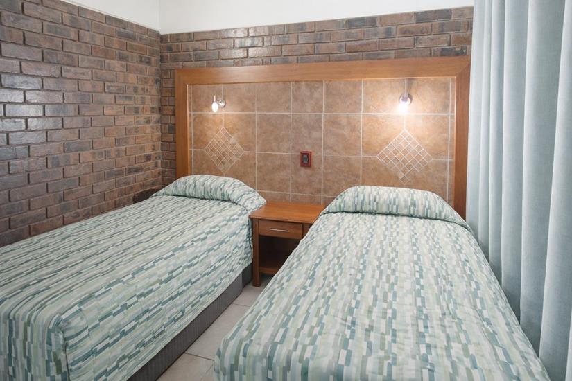 Badplaas, A Forever Resort: 4-Sleeper Chalet. 2 bedrooms (1 double bed & 2 single beds)